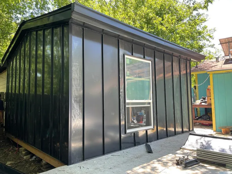 Black standing seam metal wall panels for Roof Inspection in Horn Lake