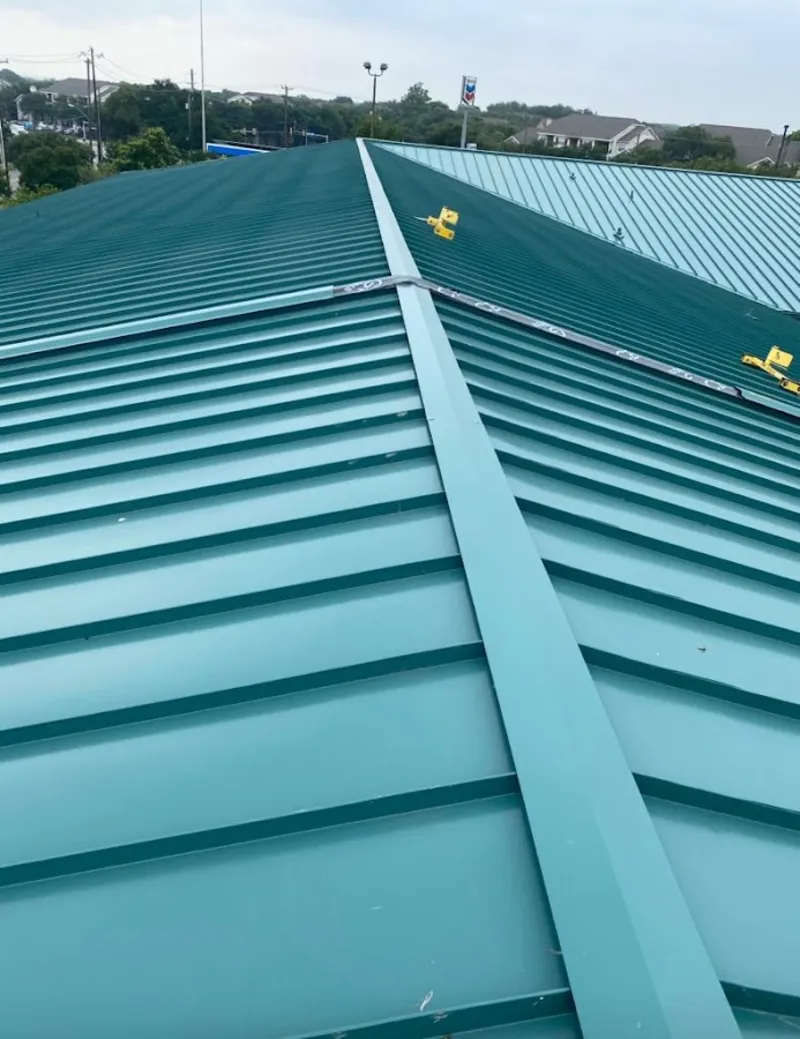 Green commercial metal roof ridge and valley for Metal Roof Repair in Horn Lake
